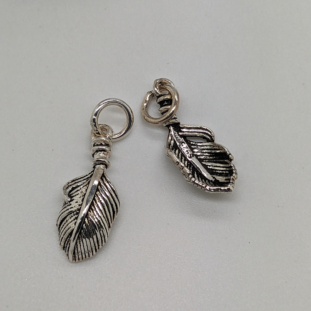sterling silver feather charm