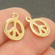 Load image into Gallery viewer, peace charm 10mm gold on st. silver - Eternalflow charms and Jewellery supplies
